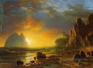 Coucher de soleil sur la côte Albert Bierstadt Plage Peinture à l'huile
